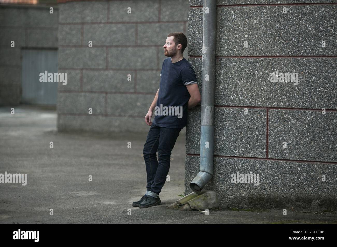 Confident man posing in selvedge  jeans Stock Photo