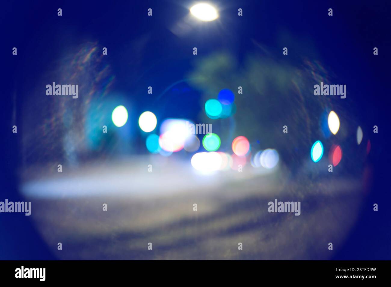 Defocused night rain city hi-res stock photography and images - Alamy
