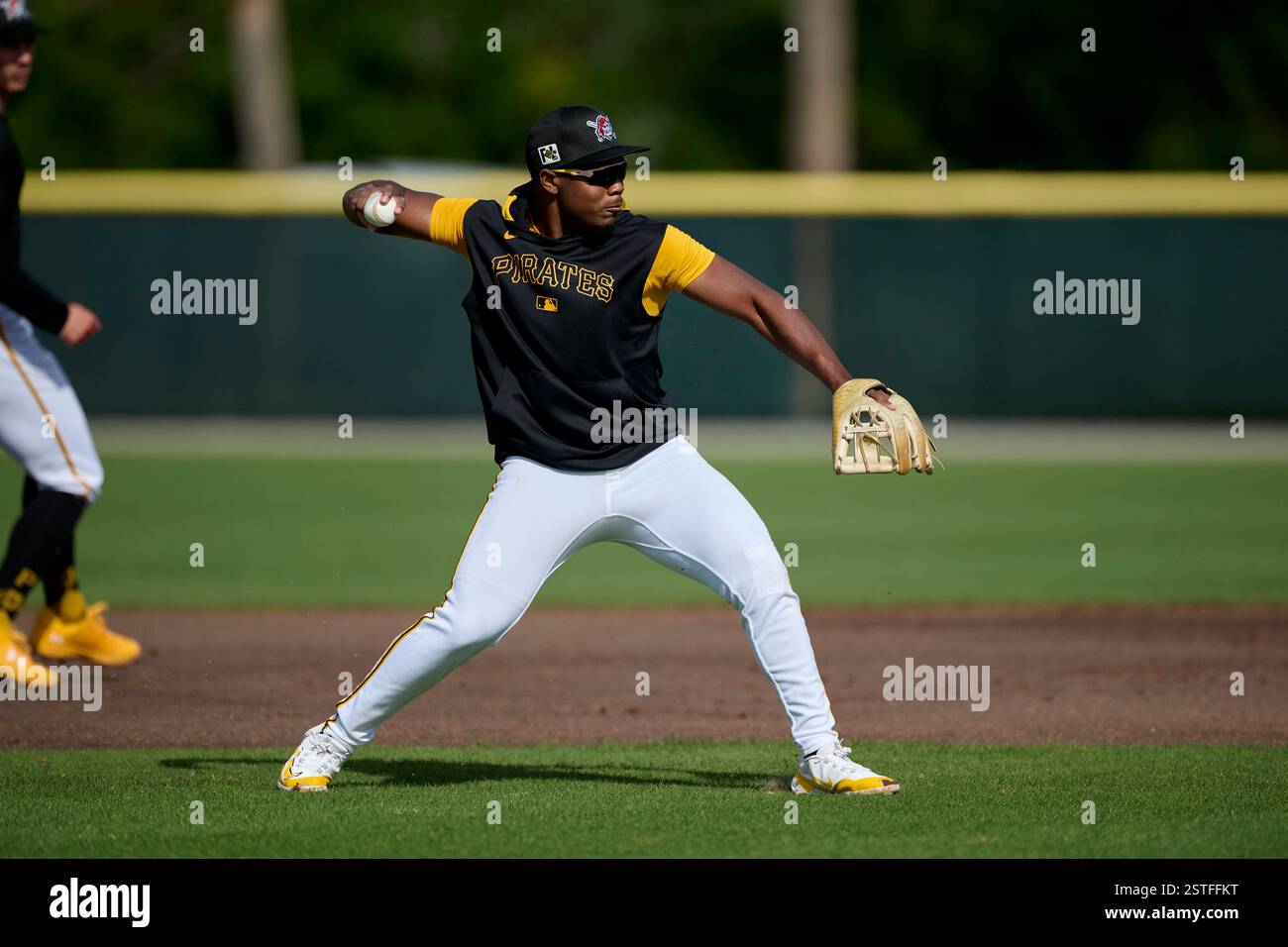 Pittsburgh Pirates infielder Termarr Johnson (81) throws to first base