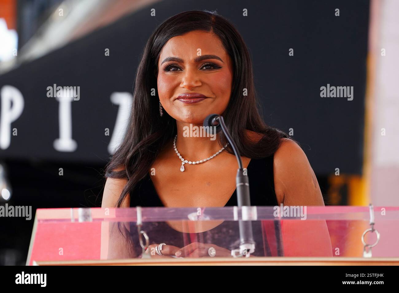 Mindy Struss Mindy Kaling speaks at a ceremony honoring her with a star on the ...