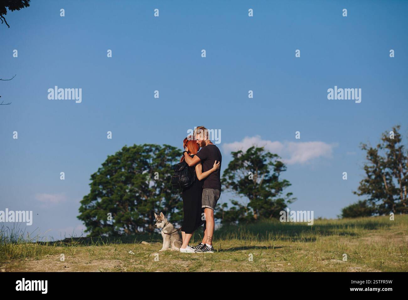 Couple standing hill watching hi-res stock photography and images - Alamy