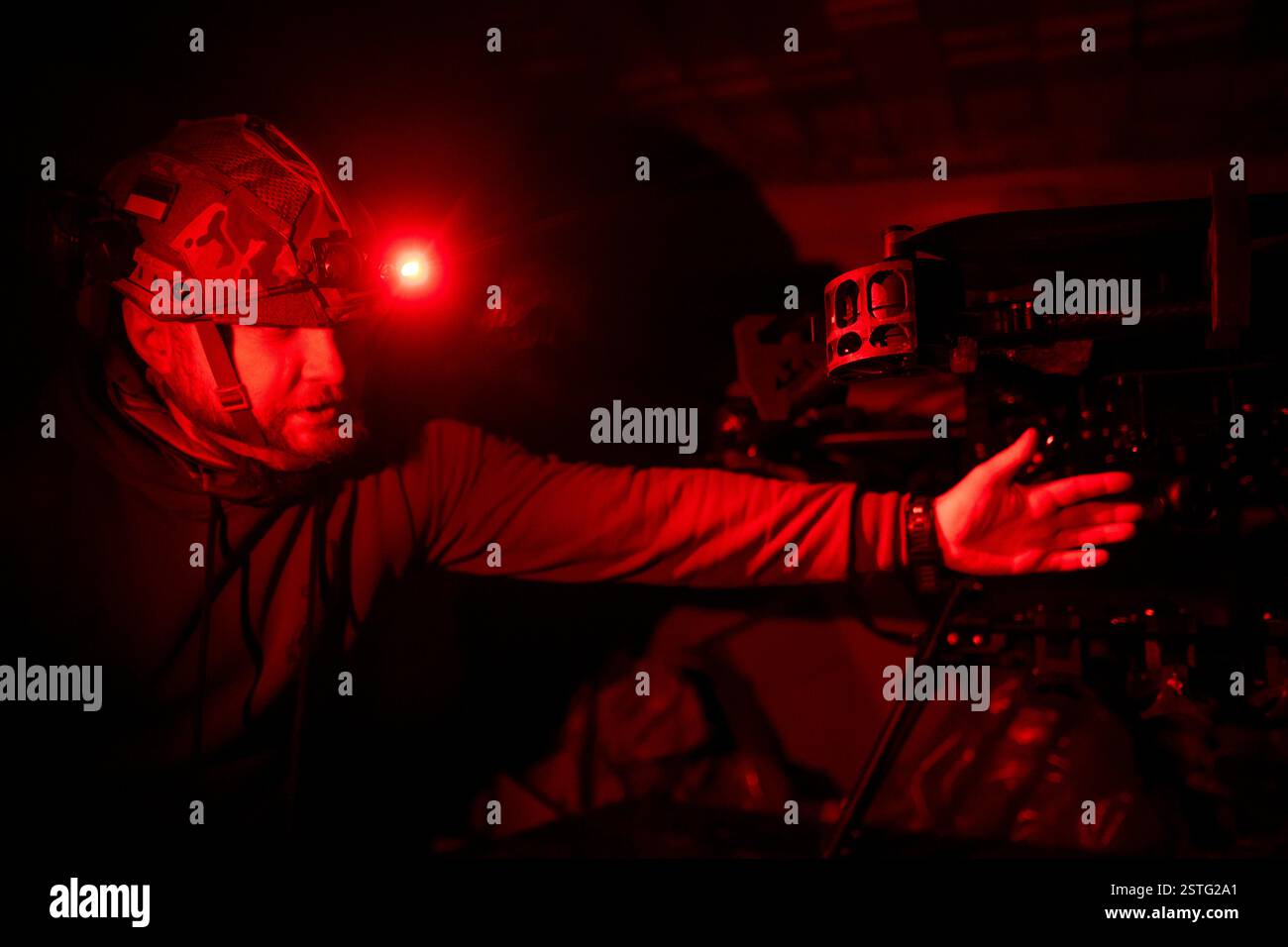 Inside an underground bunker, Ukrainian drone operator is seen next to ...