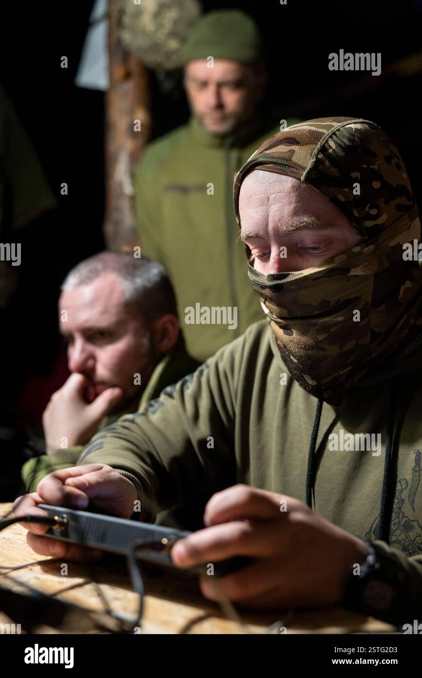 Inside an underground bunker, Ukrainian drone operators fly a drone to ...