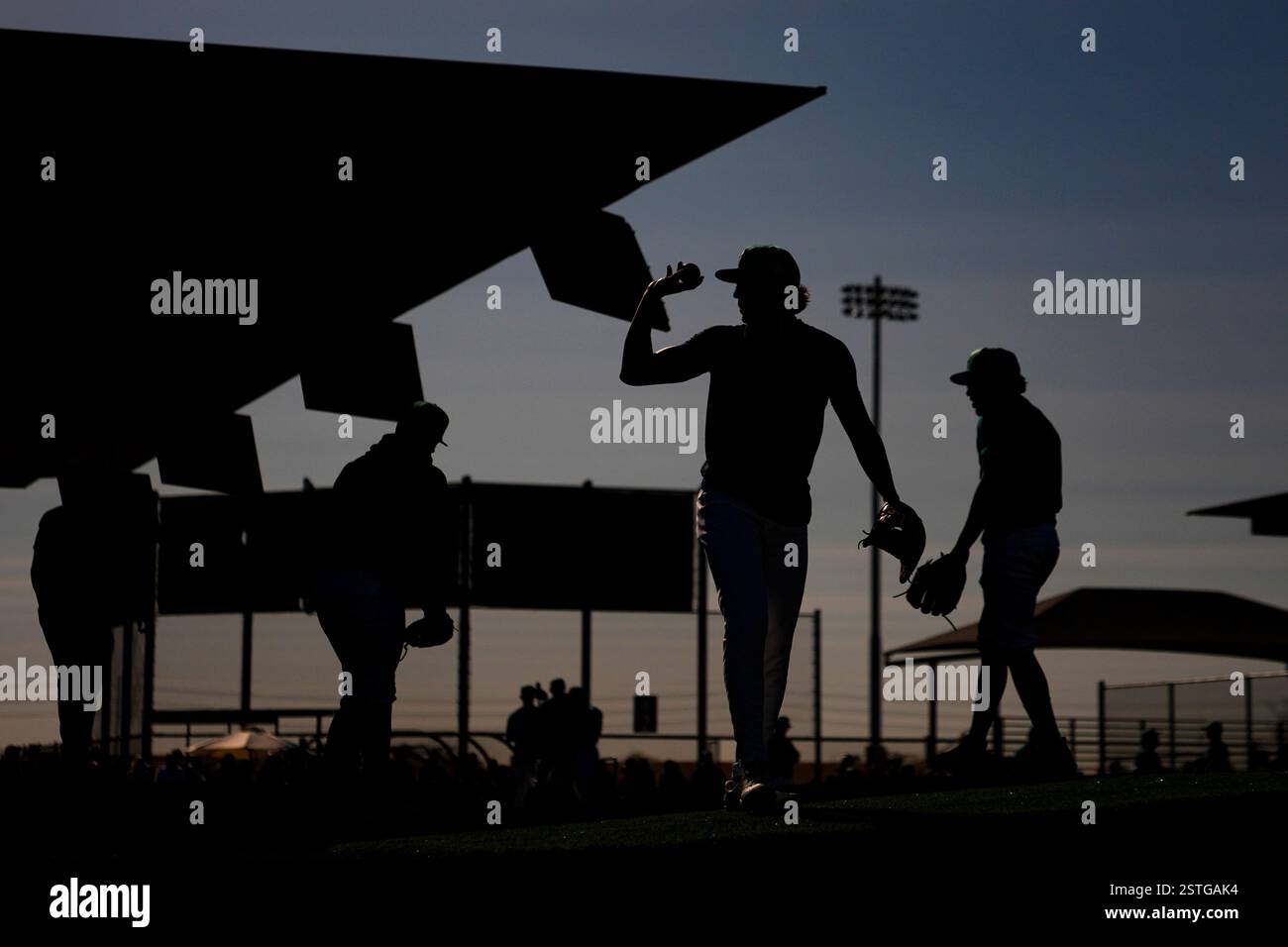 Seattle Mariners pitchers warm up in the bullpen during spring training ...