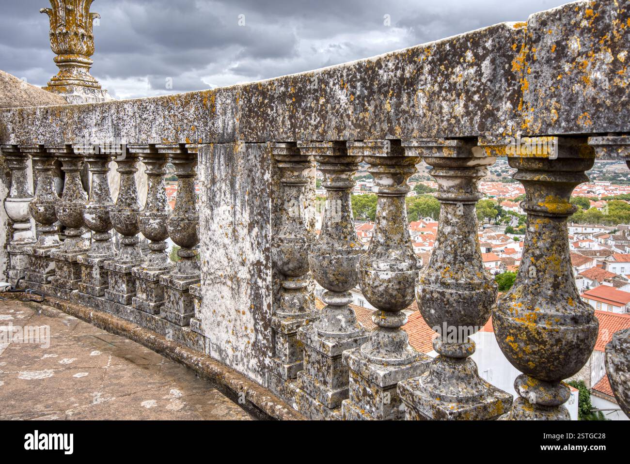 Old weathered moss covered gray granite balustrade railing Stock Photo ...