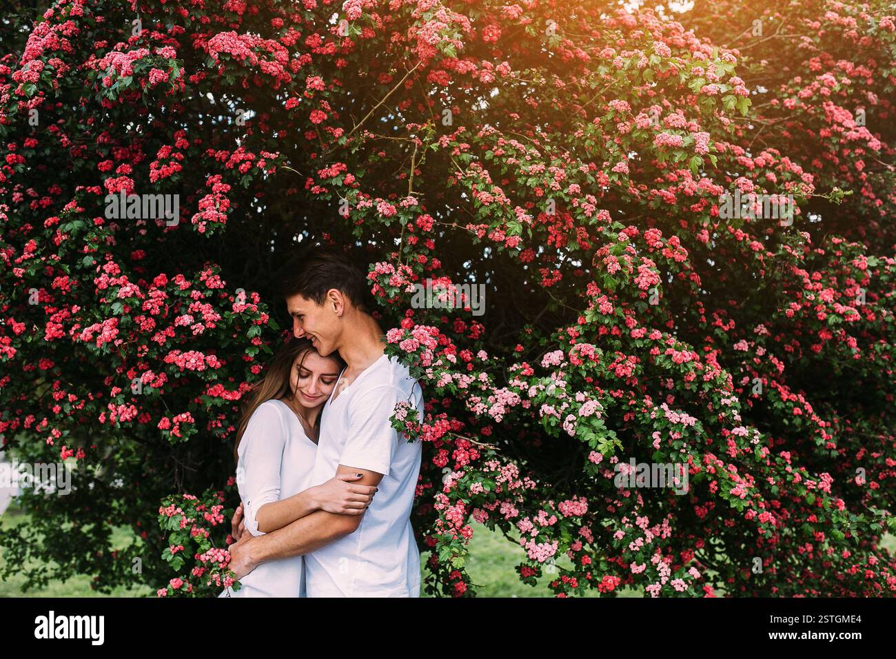 Young happy couple in love outdoors. loving man and woman on a walk in ...