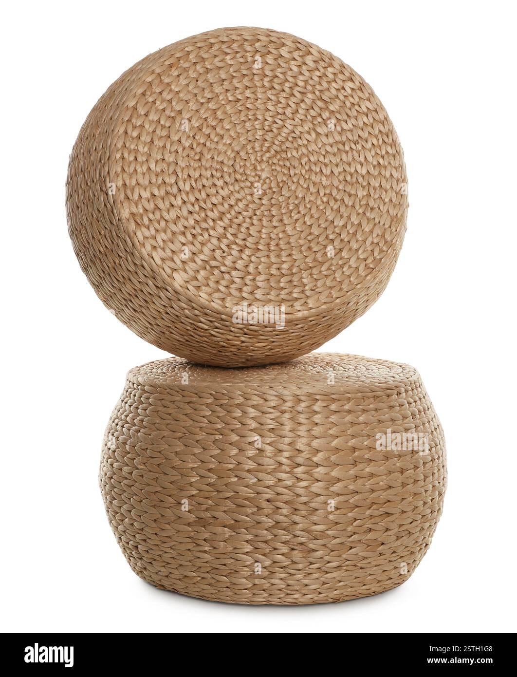 Two stylish wicker poufs on white background Stock Photo