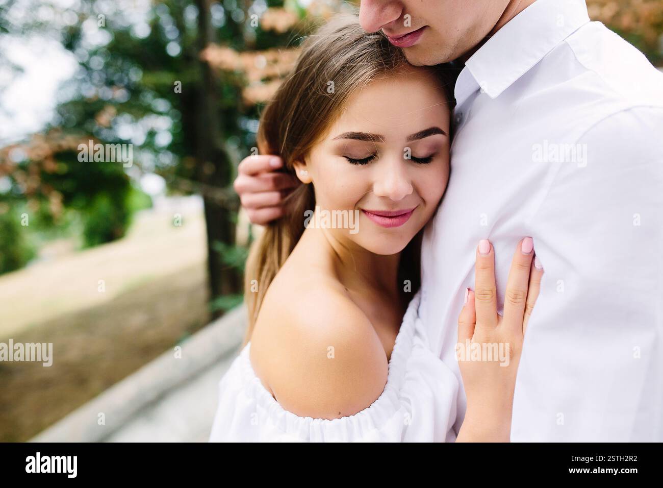 Modern couple engaged in hi-res stock photography and images - Alamy