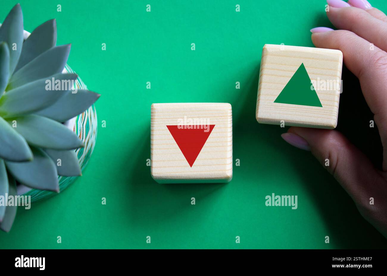 Interest rate symbol. Businessman hand is making a choice between two ...