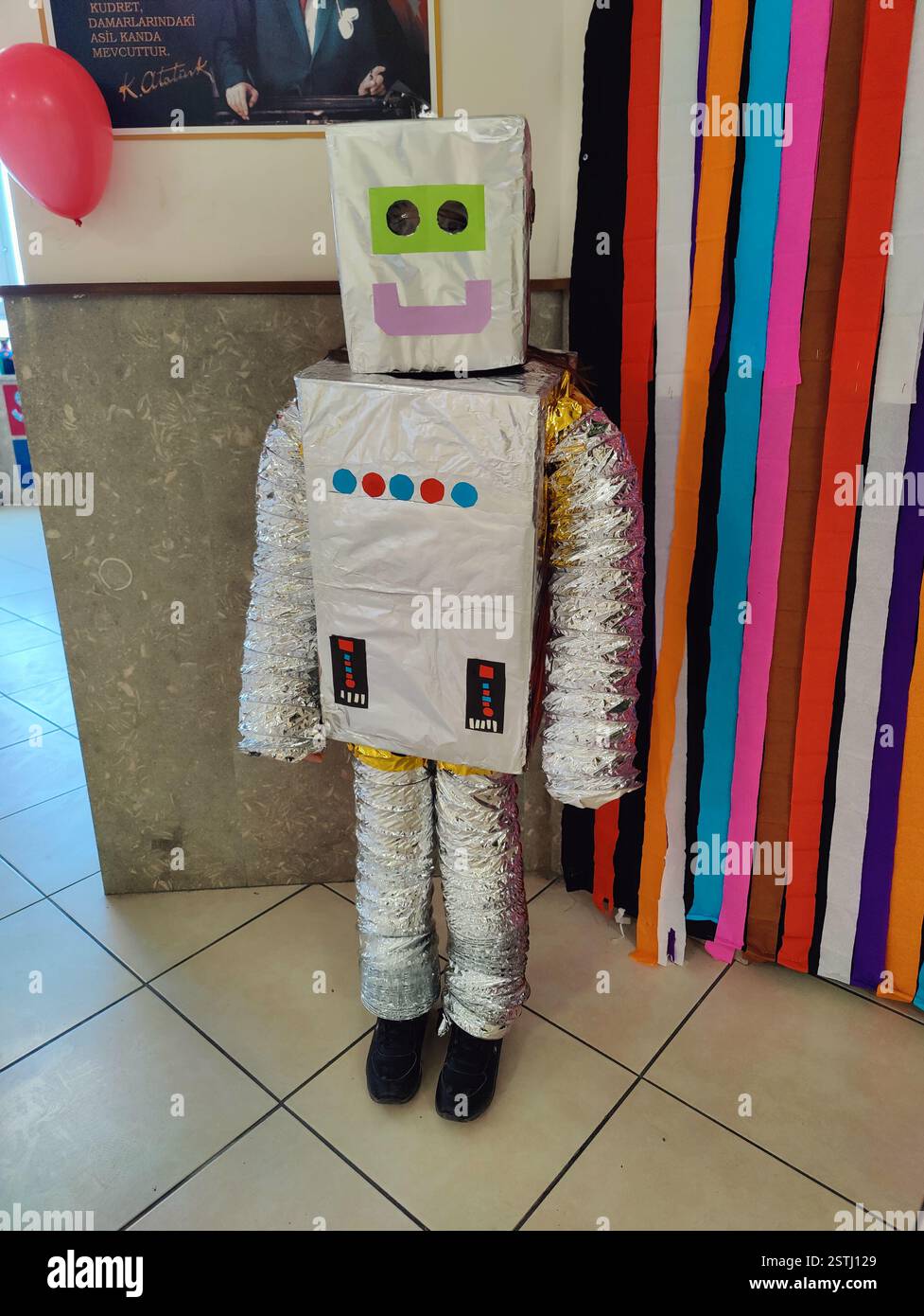 Handmade Retro Robot Costume – A Child's Creative Sci-Fi Transformation Stock Photo