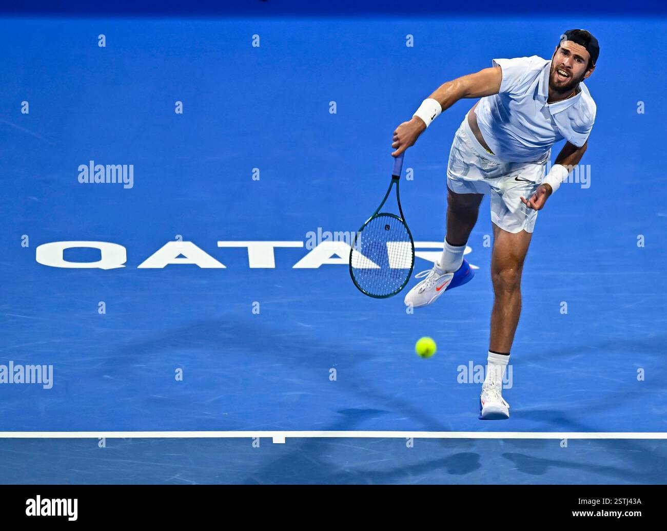 (250219) DOHA, Feb. 19, 2025 (Xinhua) Karen Khachanov serves