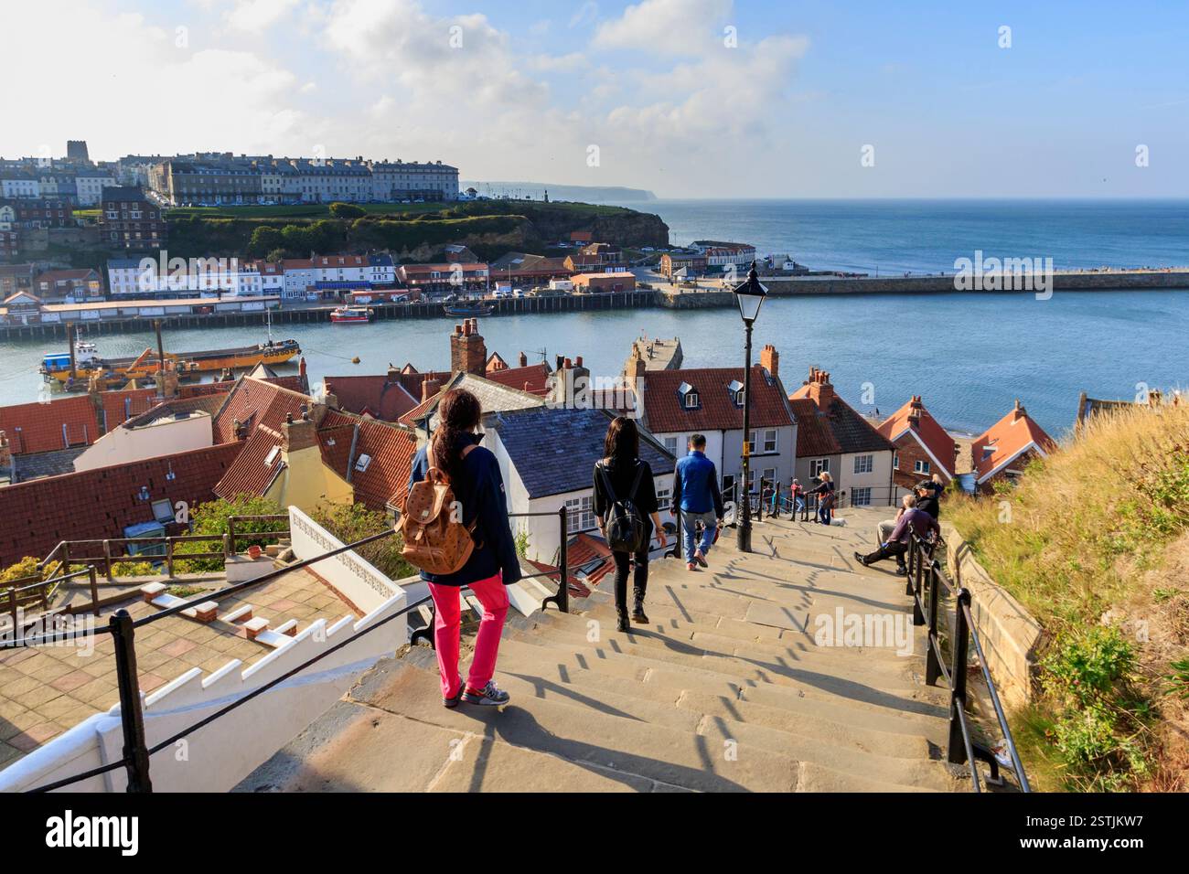 People walking the 199 steps whitby Stock Photo - Alamy