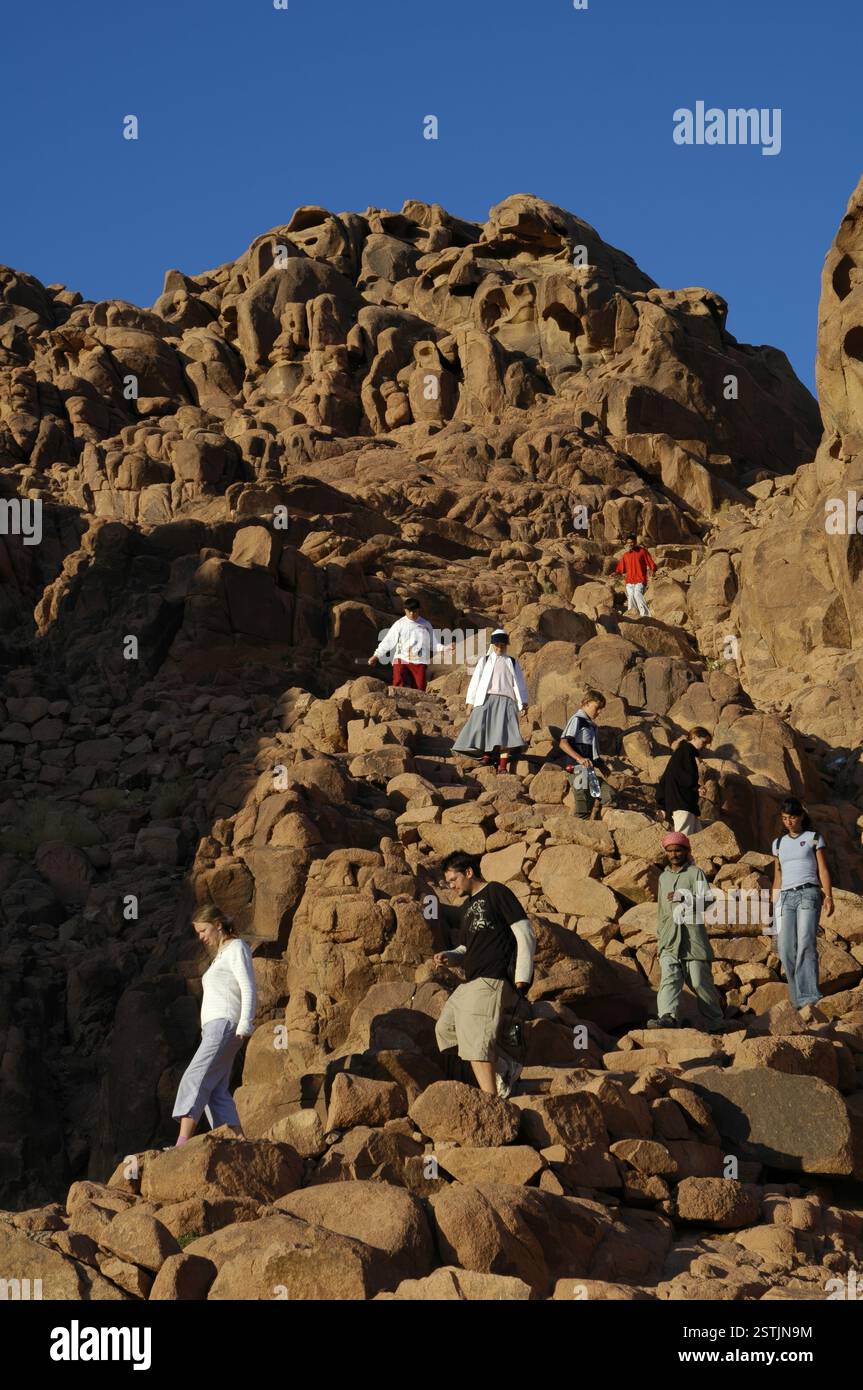 Tourists descending from the summit of Mount Sinai also known as Mount ...