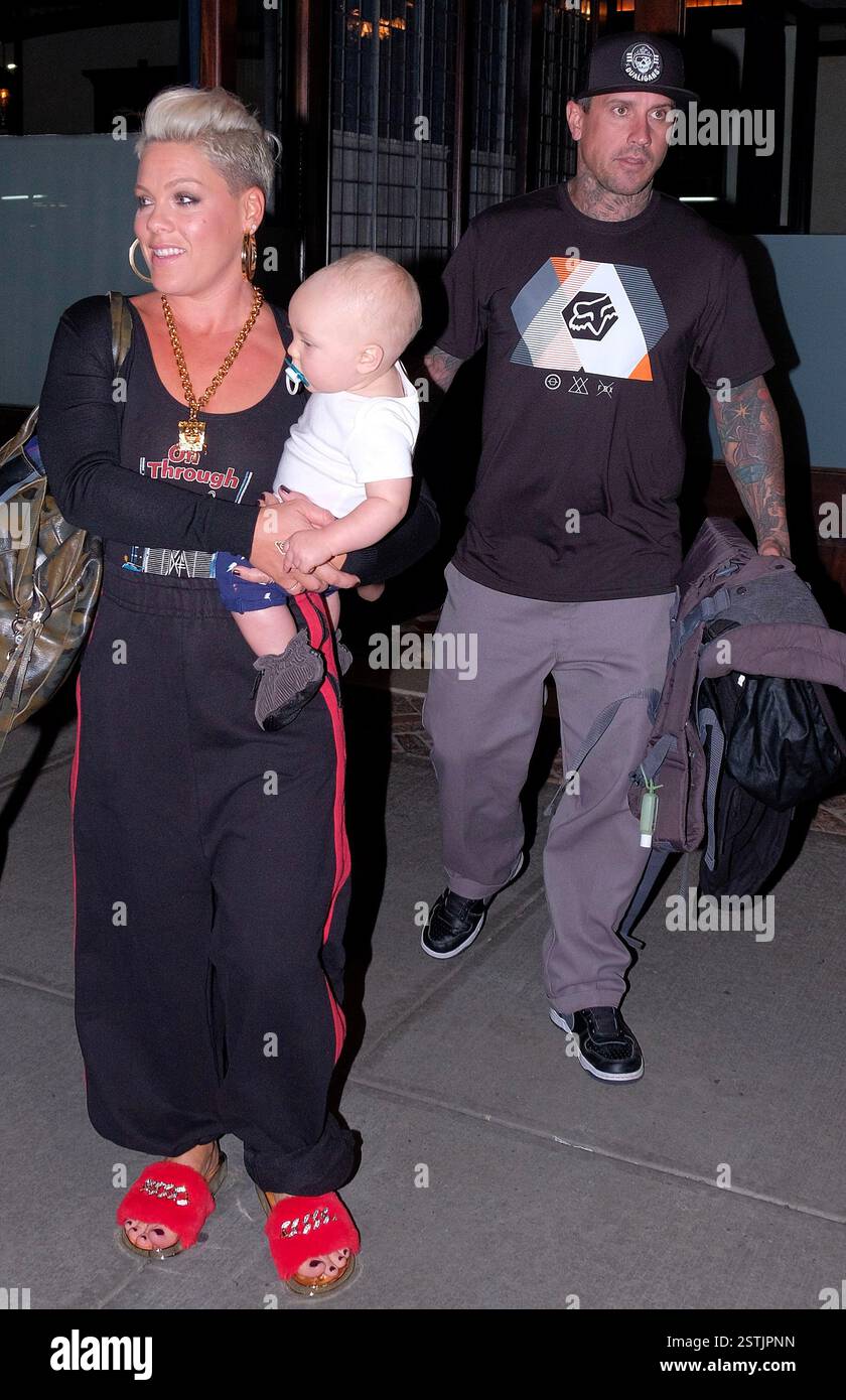Singer Pink leaving her Manhattan hotel while holding her son Jameson(00)