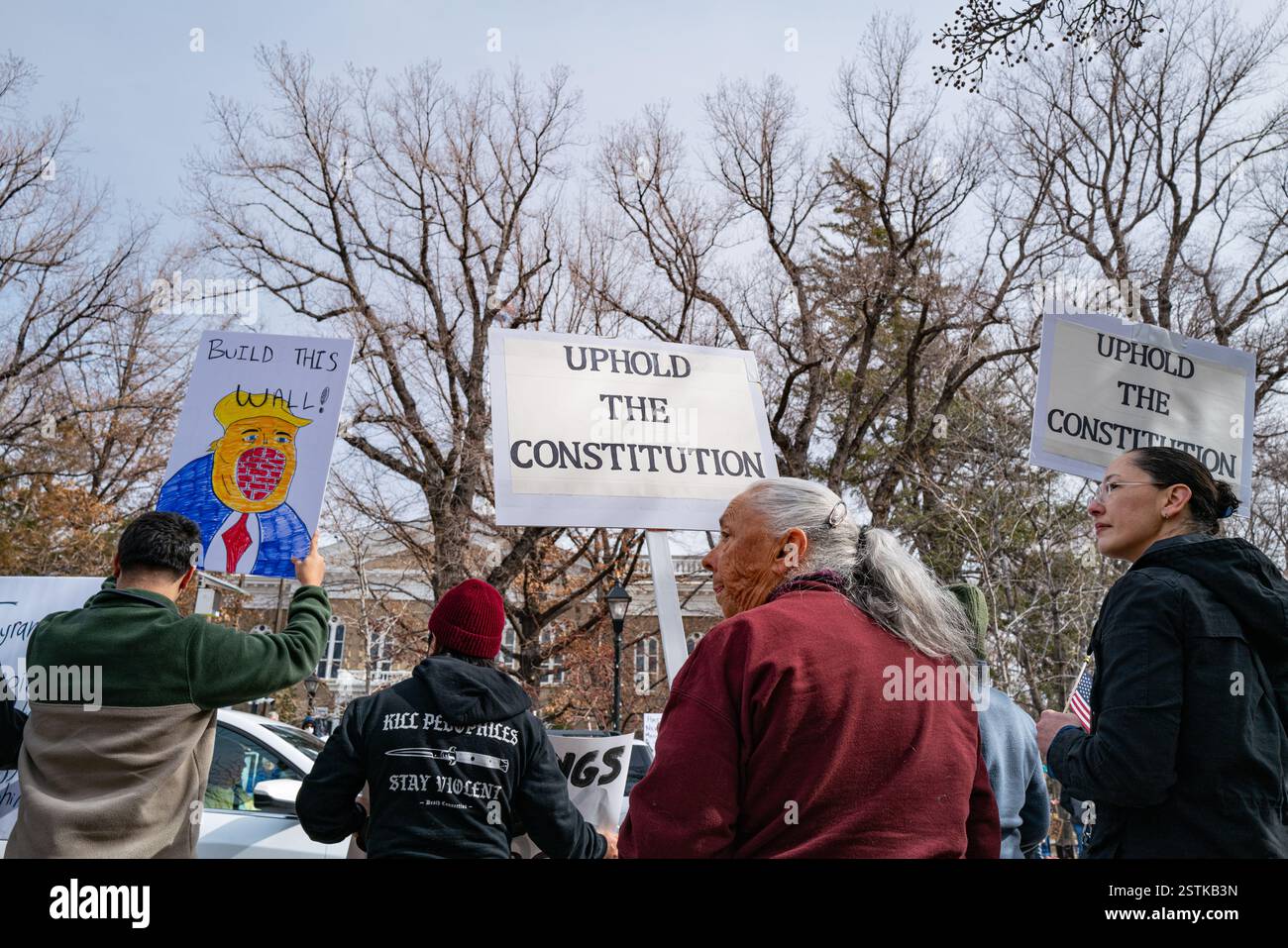 Two women hold sign hi-res stock photography and images - Alamy