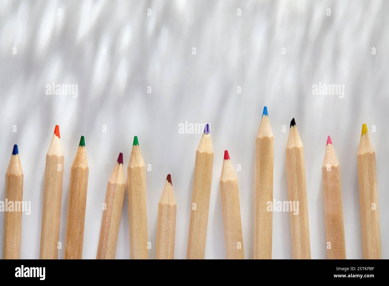 Colorful pencils on white background Stock Photo