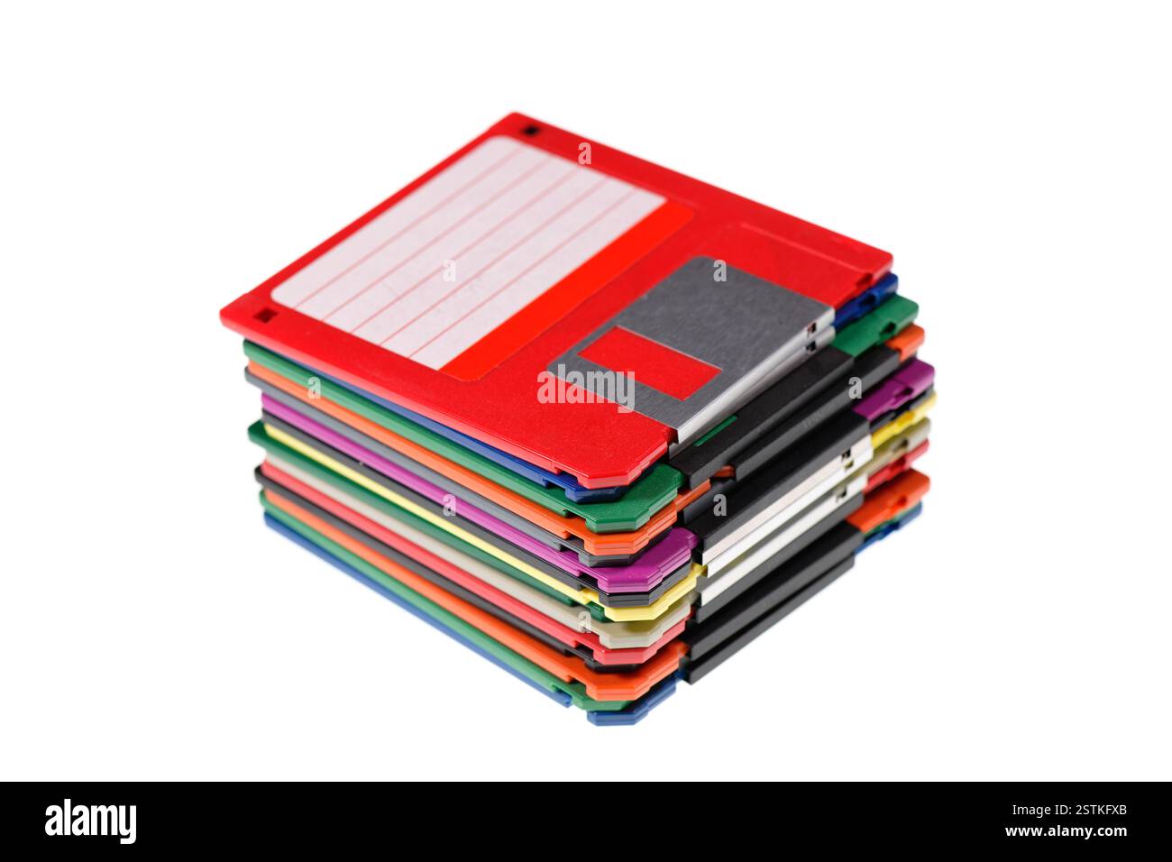 A stack of vintage computer colored floppy disks Isolated on white. Old technologies. Selective focus Stock Photo