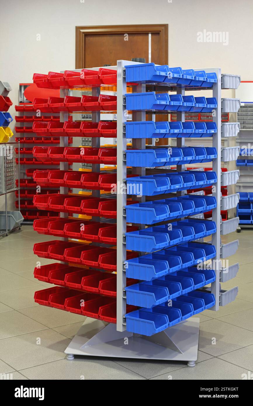 Blue and Red Plastic Racks for Small Parts Storage Stock Photo - Alamy