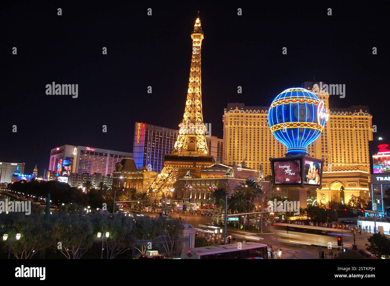 Vibrant night scene of the Las Vegas Strip, with bright lights and ...