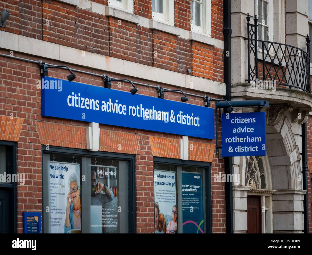 Blue signage of Citizens Advice Rotherham and District displayed on the exterior of the building Stock Photo