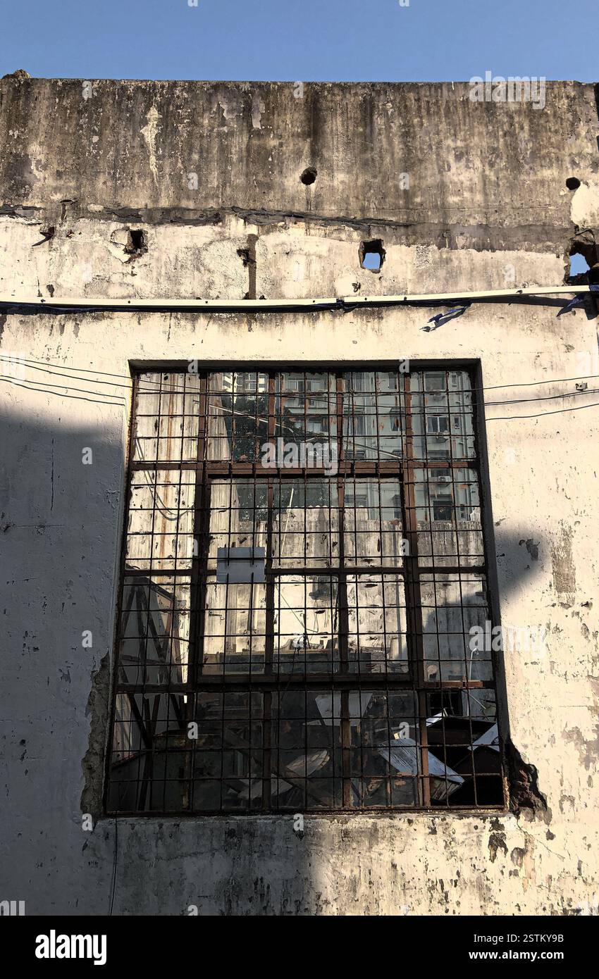 A blend of classical sculptures and urban structures – capturing the essence of both history and progress - Smartphone Captured Stock Image