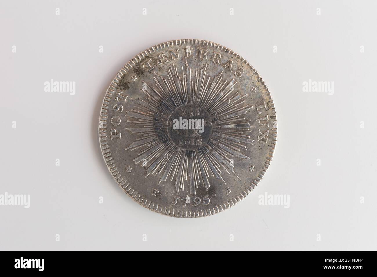Coin With Inscription Anonymous coin from 1795 featuring the arms of Geneva surrounded by two ...