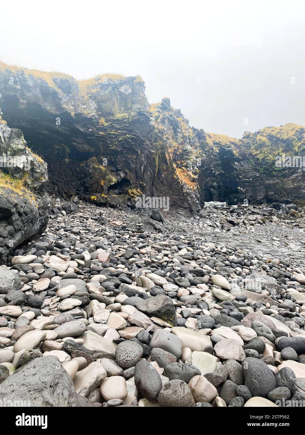 Spain Cliffs Steep rocky cliff partially shrouded hi-res stock photography and ...