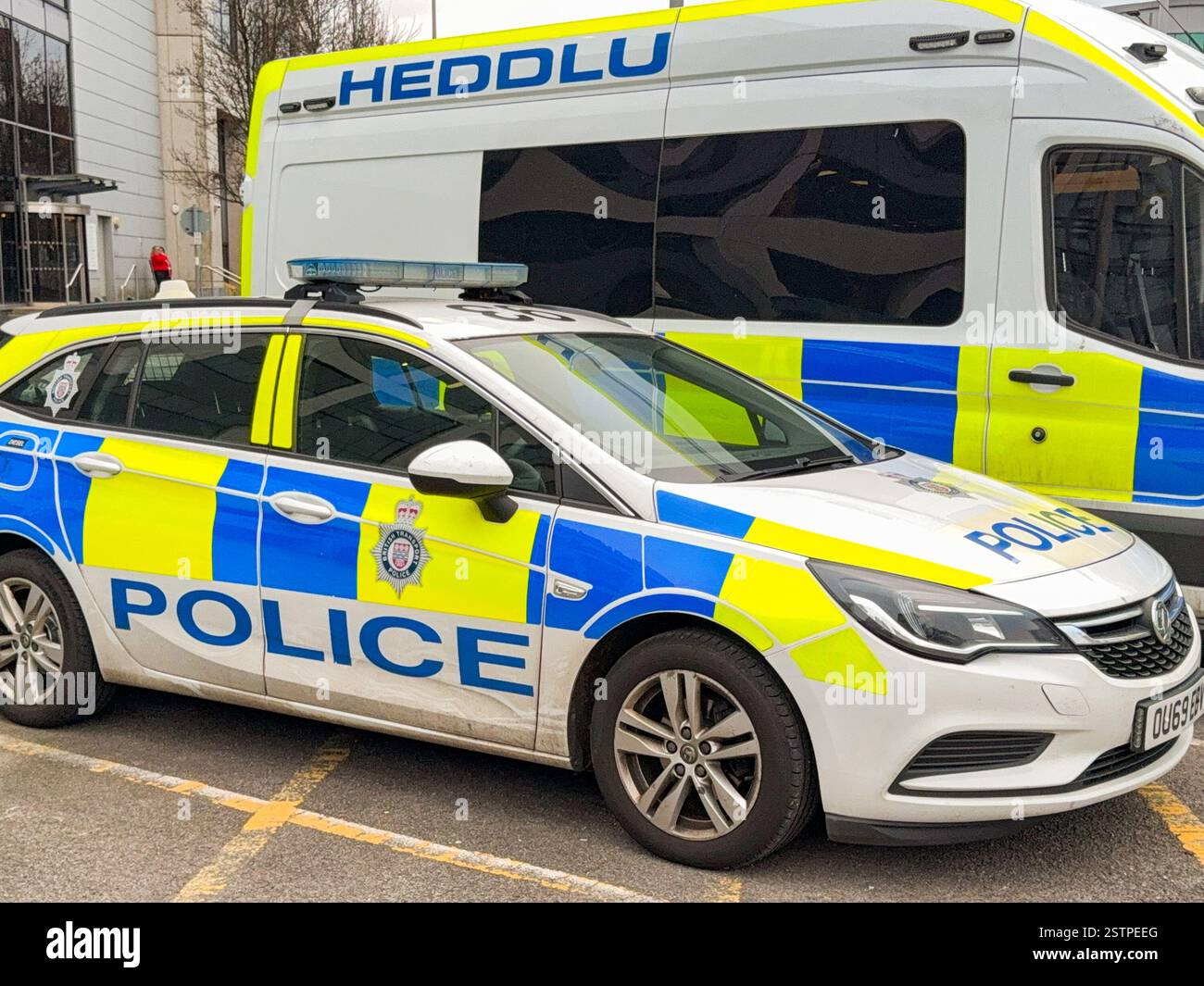 Cardiff, Wales, UK - 11 December 2024: Police vehicles used by the British Transport Police parked outside Cardiff Central railway station - Smartphone Captured Stock Image