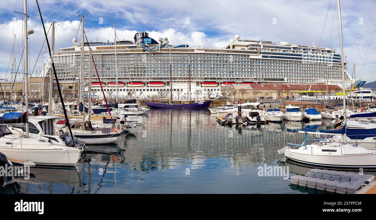 Vigo, Spain - 14 January 2025: Panoramic view of the marina in Vigo with a visiting cruise ship, Norwegian Bliss, in the background - Smartphone Captured Stock Image