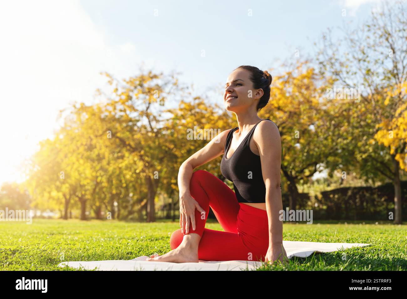 Woman yoga autumn sit hi-res stock photography and images - Alamy