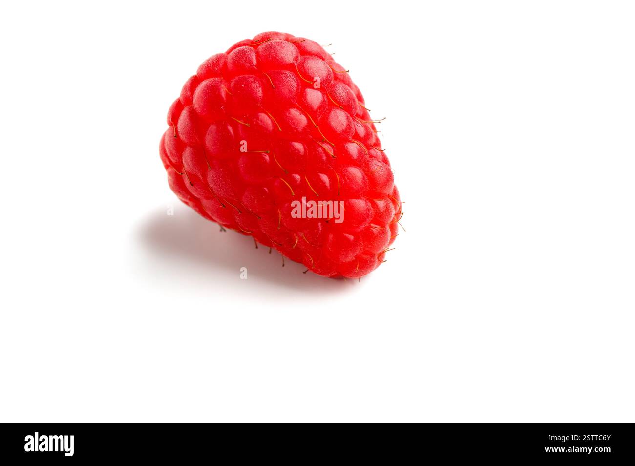 Fresh raspberry on white background Stock Photo - Alamy
