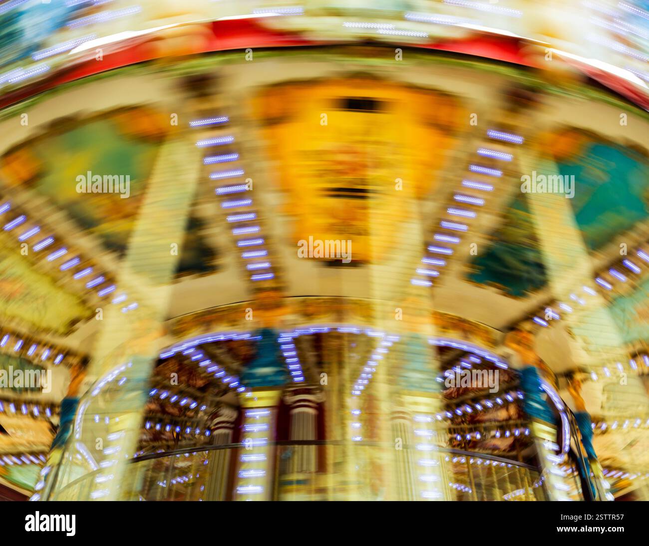Vintage traditional carousel spinning, with motion blur Stock Photo Alamy