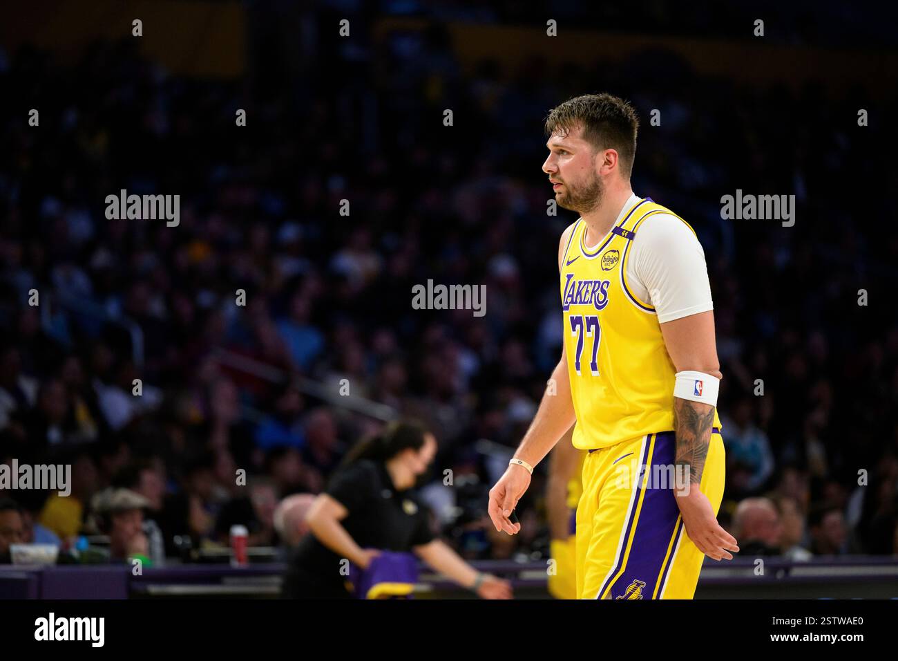Los Angeles Lakers guard Luka Doncic (77) walks down the court during ...