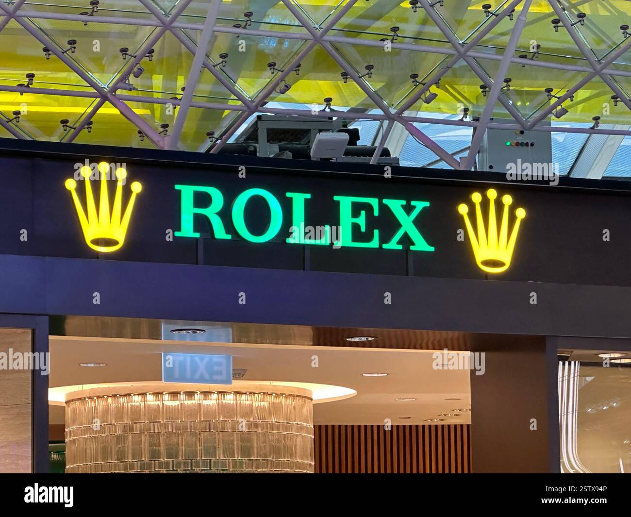 Bangkok, Thailand  - Jan 4, 2024: Rolex store sign. Rolex SA is a Swiss watch designer and manufacturer based in Geneva. - Smartphone Captured Stock Image