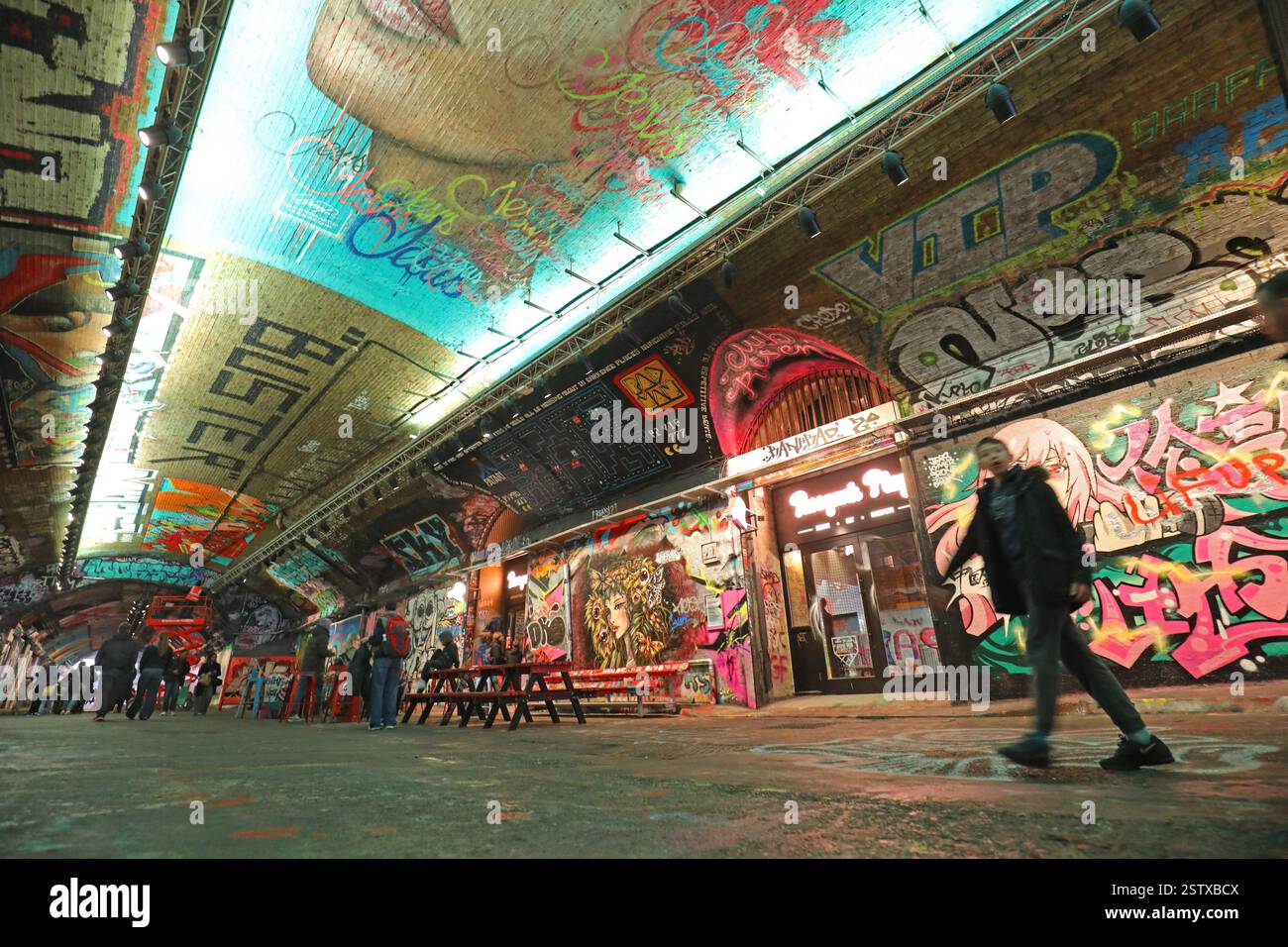 Leake Street Arches, London, UK. A pedestrianised tunnel below Waterloo Station where graffiti is legally permitted. Also houses restaurants and bars. Stock Photo