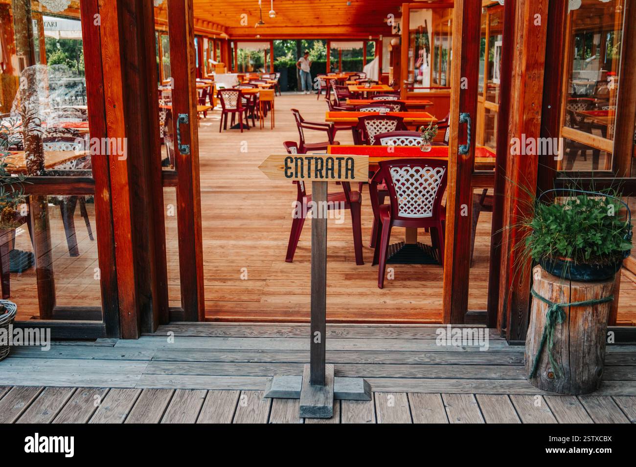 Entrance to the restaurant. The restaurant is empty. The restaurant is in vintage style. Trento, Italy, June 20, 2024. Stock Photo