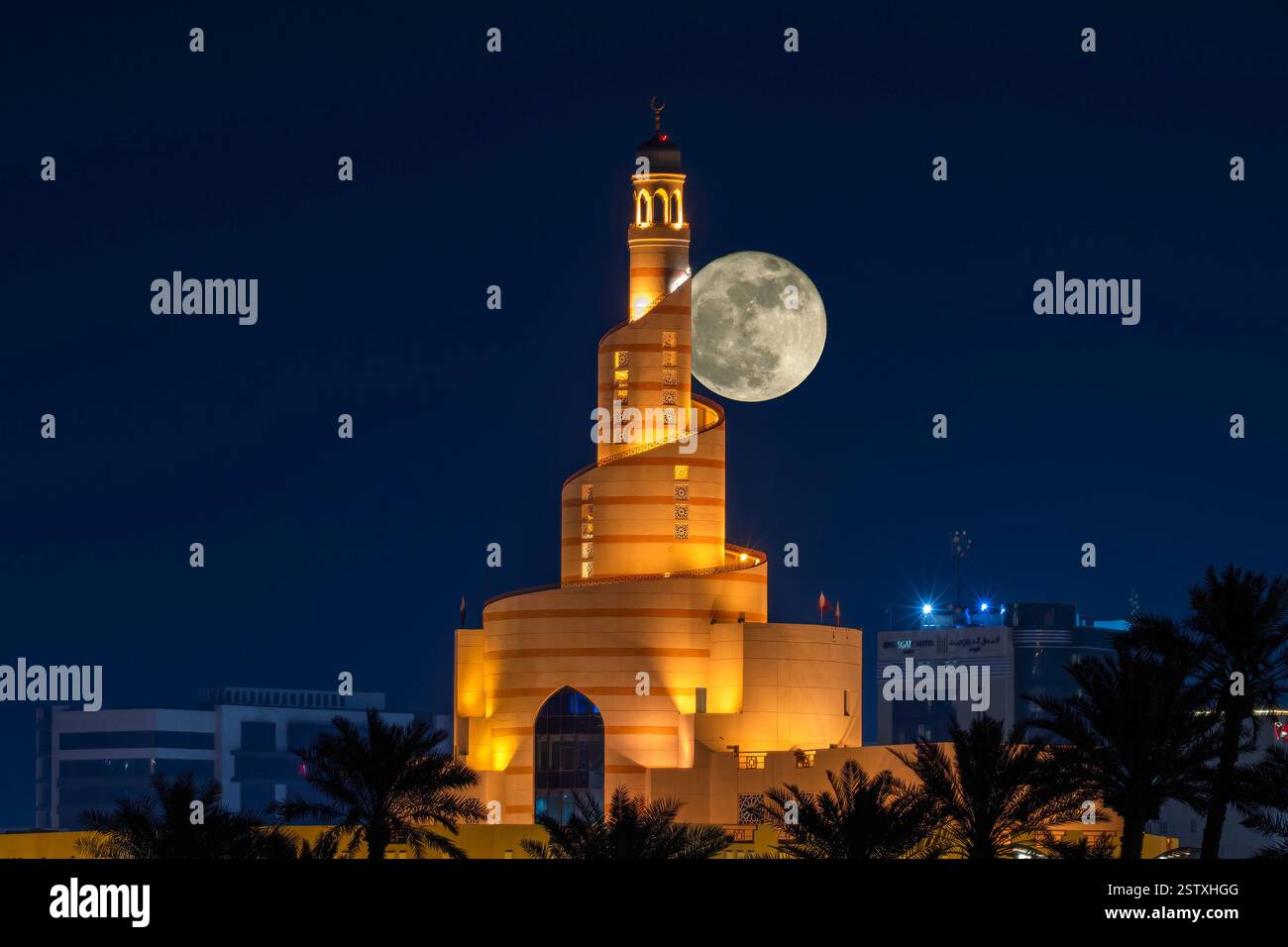 Fanar minaret Islamic cultural center Souq waqif with the full moon ...