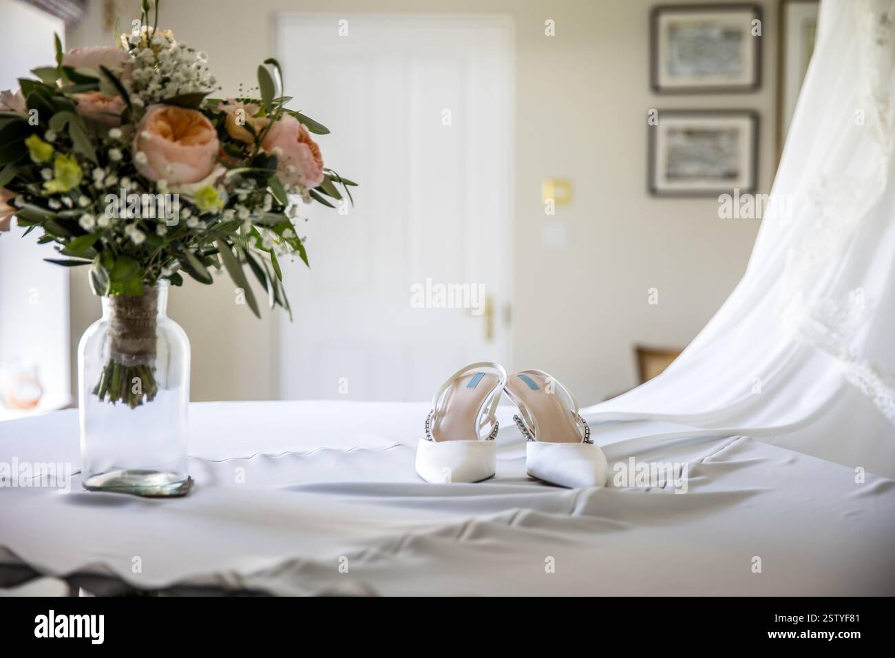 Wedding dress on a piano at a wedding ceremony Stock Photo - Alamy