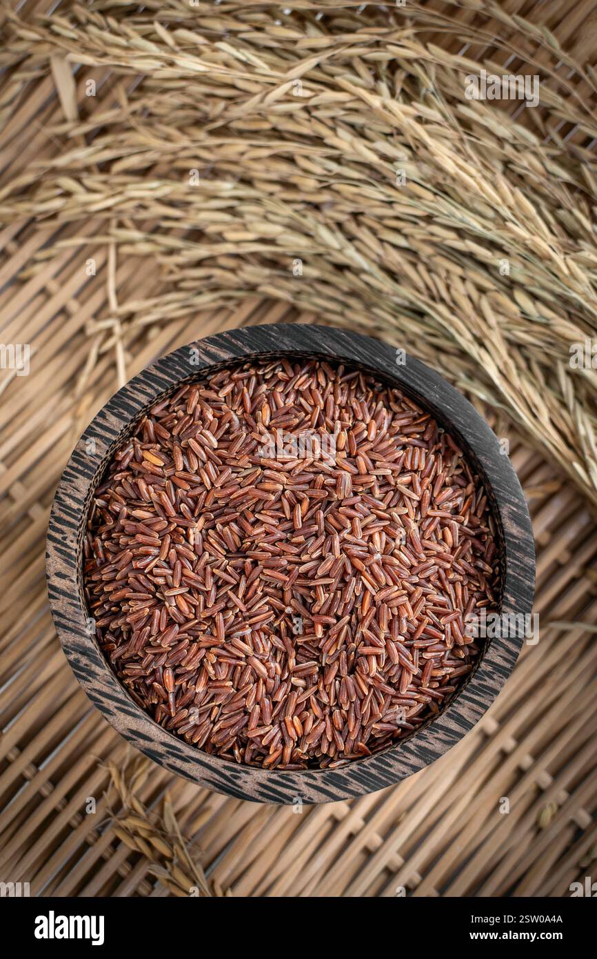 Rustic Red Rice unhulled organic asian red rice grains in rustic setting display in ...