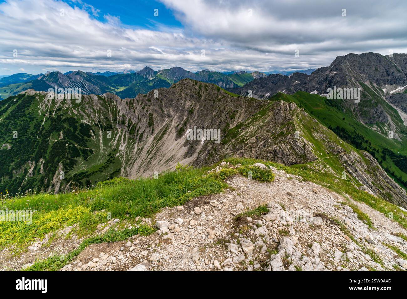 Breathtaking mountain landscape with lush green valleys and rugged ...