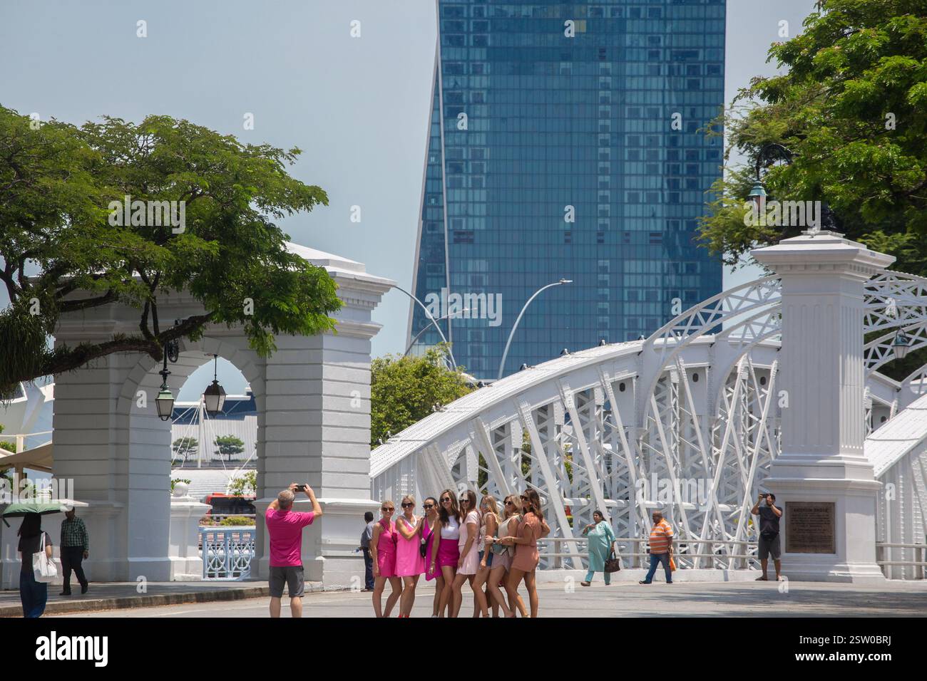 Beautiful dress up caucasian ladies posing together for group picture against the Marina Bay Sands architecture spot for memory trip. Singapore. Stock Photo