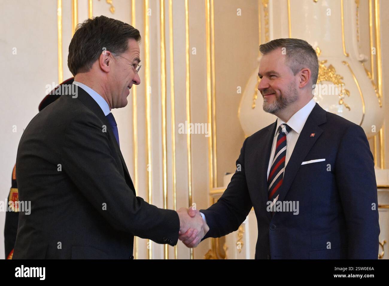 NATO Secretary General Mark Rutte, left, and Slovak President Peter