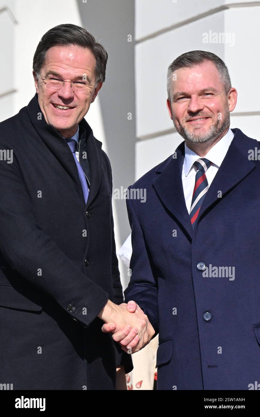 NATO Secretary General Mark Rutte, left, and Slovak President Peter