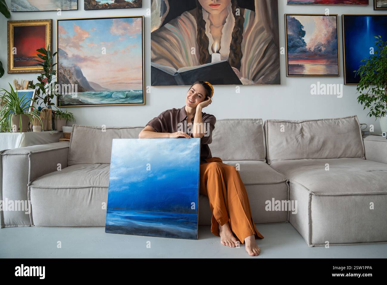 Contentedly hi-res stock photography and images - Alamy