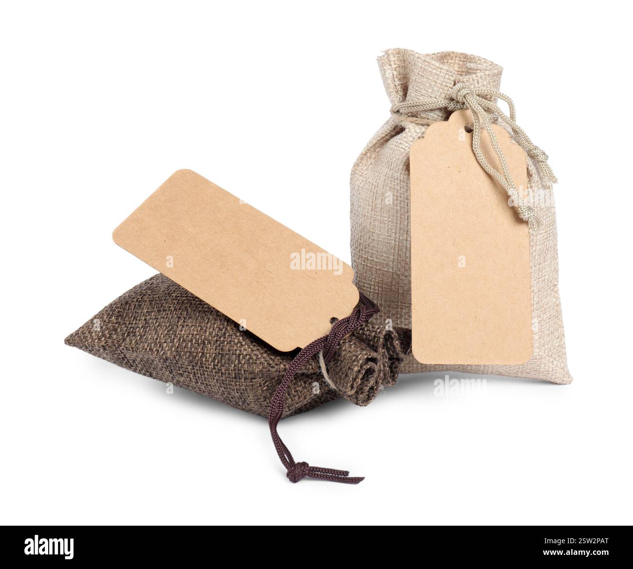 Burlap bags with tags isolated on white Stock Photo