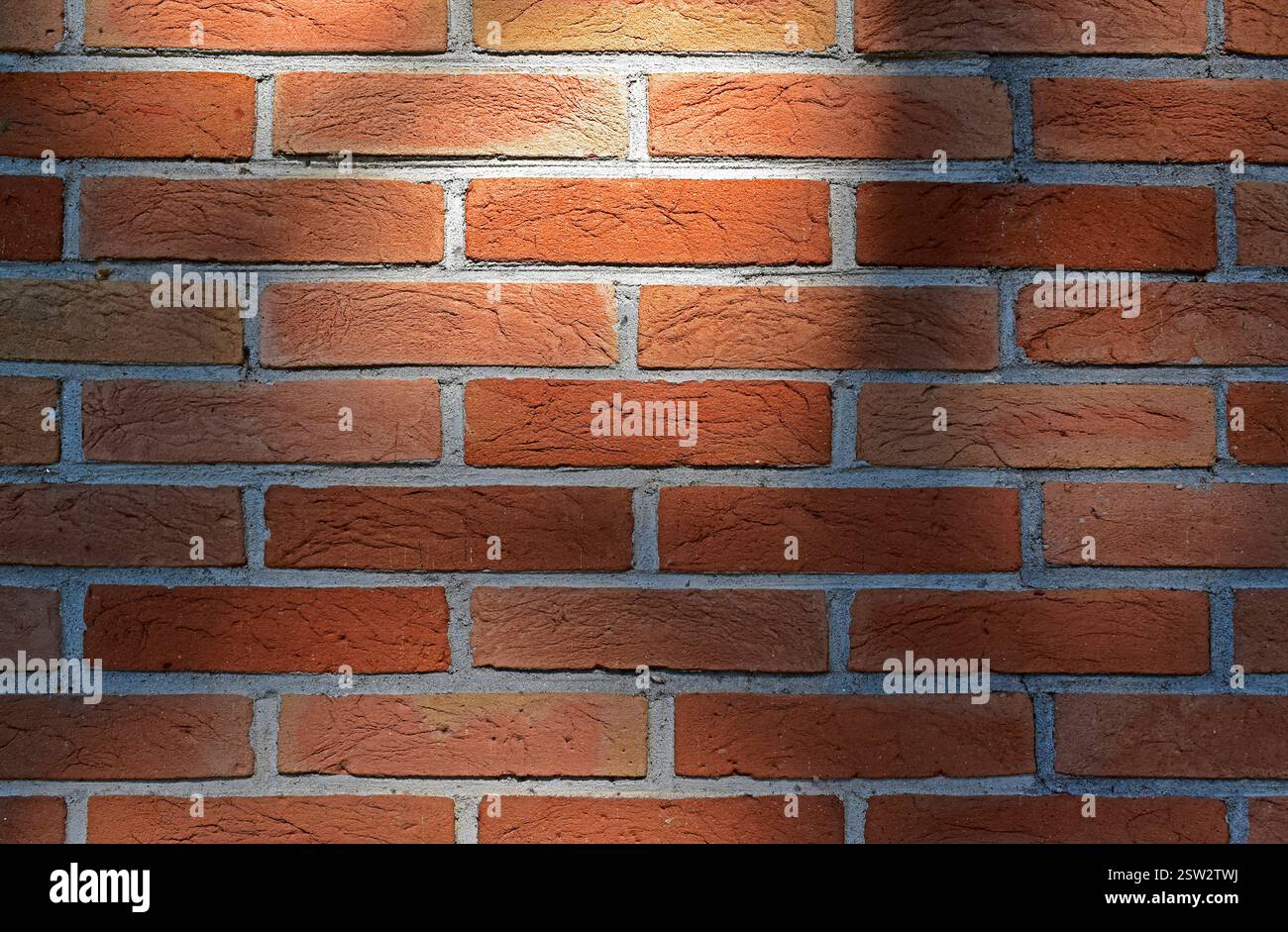 Red brick wall texture background and shadows Stock Photo