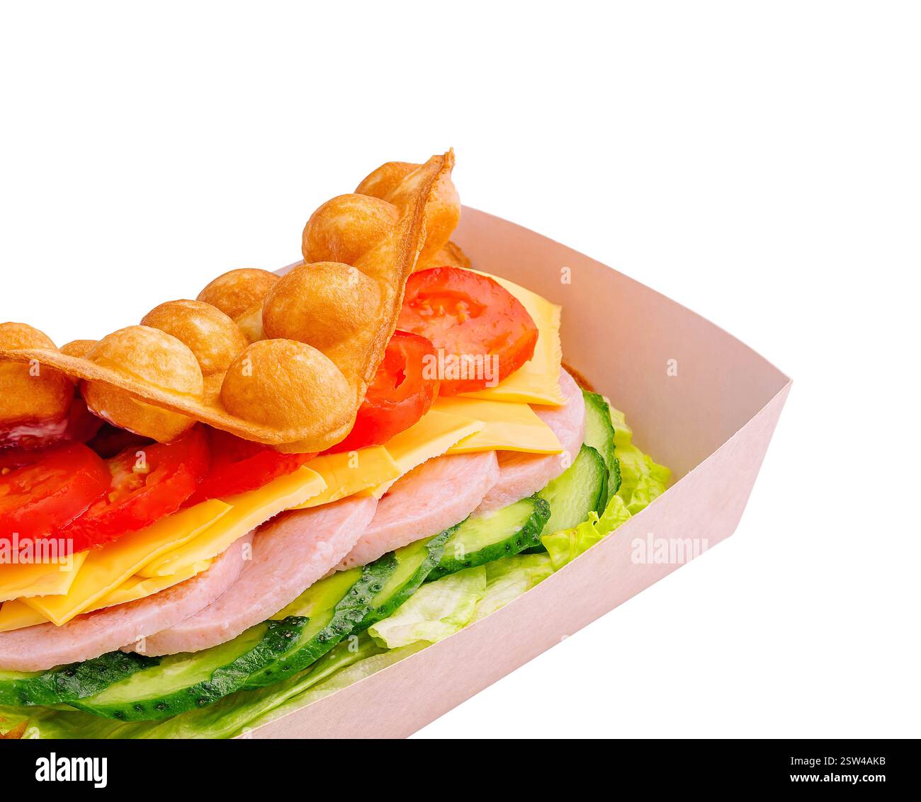 Belgian waffles with ham, cheese and salad on box Stock Photo