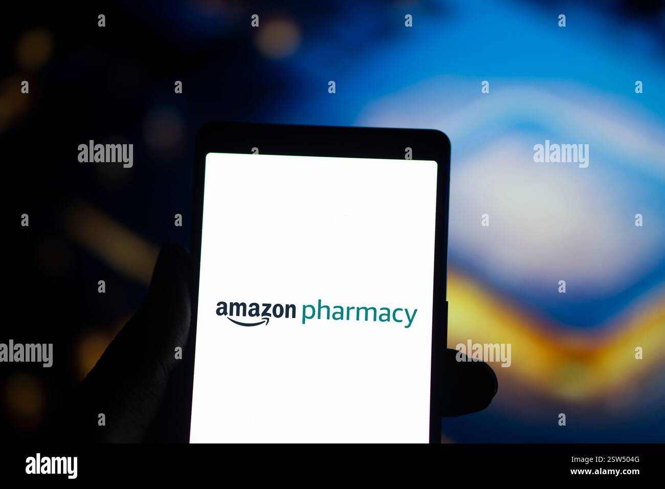 Dhaka, Bangladesh- 25 Sep 2024: Amazon Pharmacy  logo is displayed on smartphone. Stock Photo