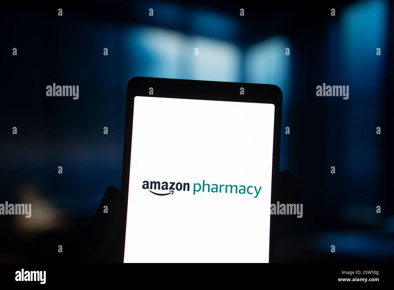 Dhaka, Bangladesh- 25 Sep 2024: Amazon Pharmacy  logo is displayed on smartphone. Stock Photo