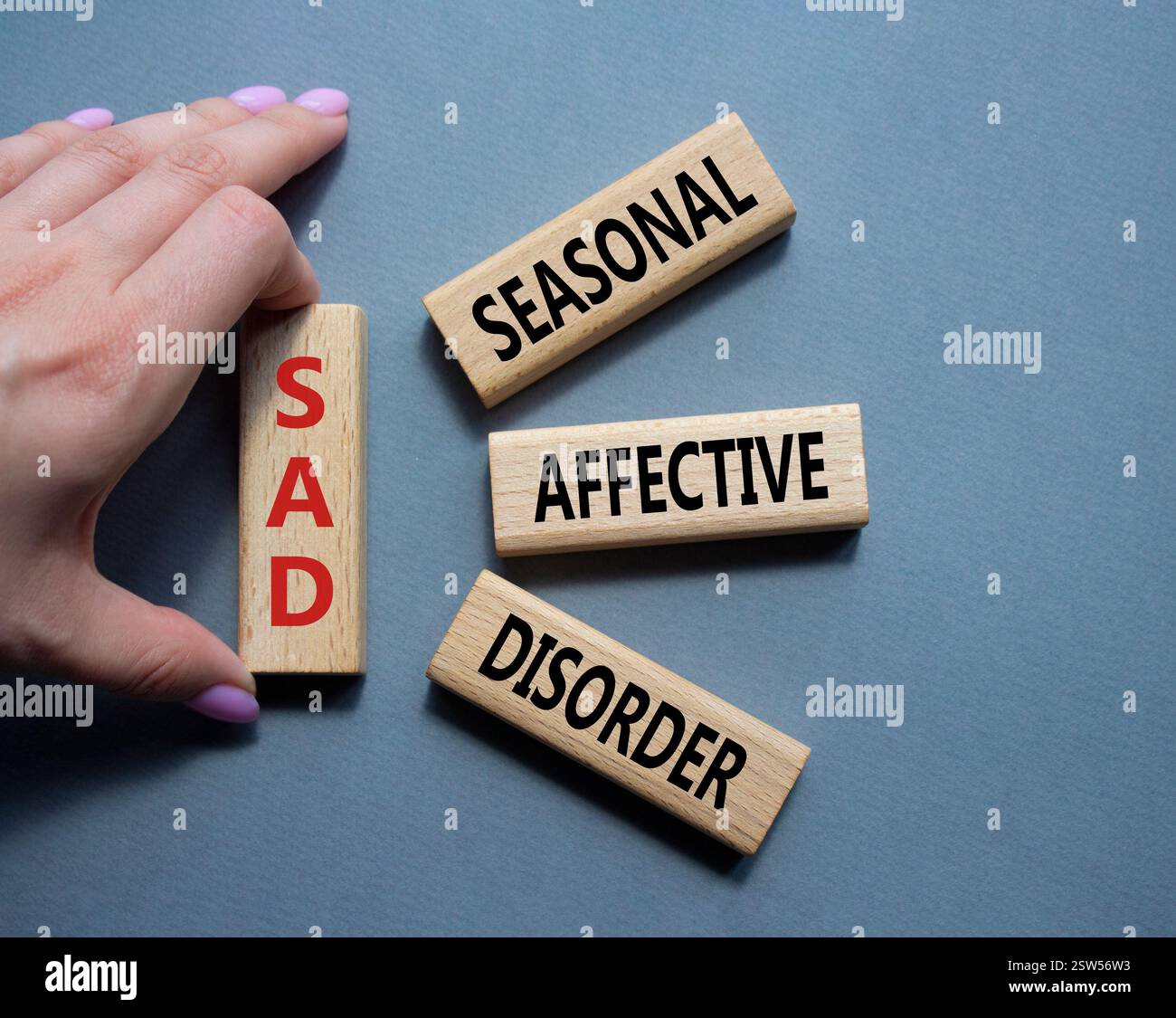 Disorder Blocks Sad - Seasonal Affective Disorder symbol. Wooden blocks with words Sad ...